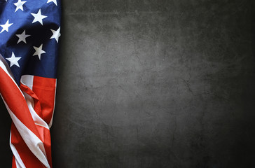 Wall Mural - American flag on a black background. Space for text.