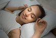 © Prostock-studio - Young Woman Sleeping In Bed Comfortably And Blissfully