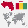 Guinea map on a world map with flag and map pointer. Vector illustration