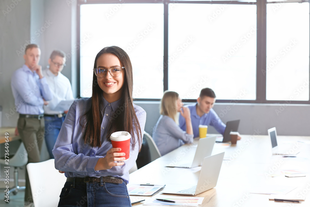 Young woman during business meeting in office