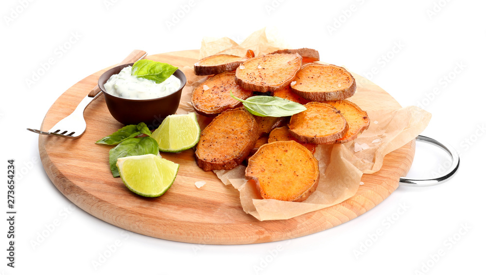 Board with tasty cooked sweet potato and sauce on white background
