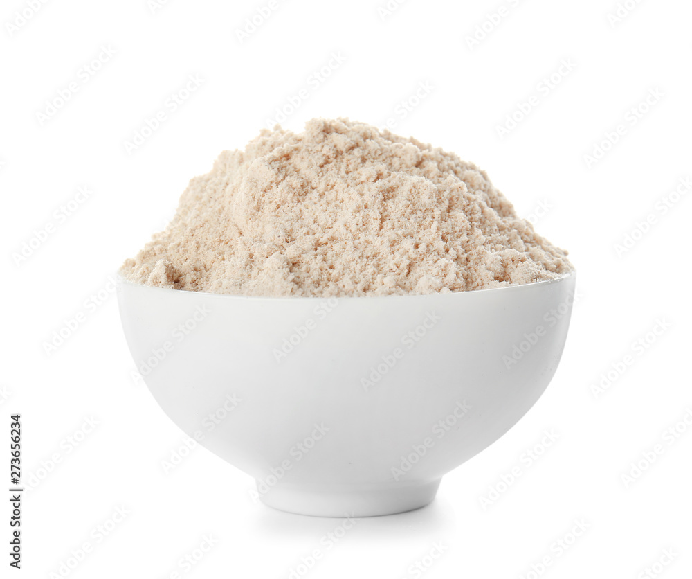Bowl with flour on white background