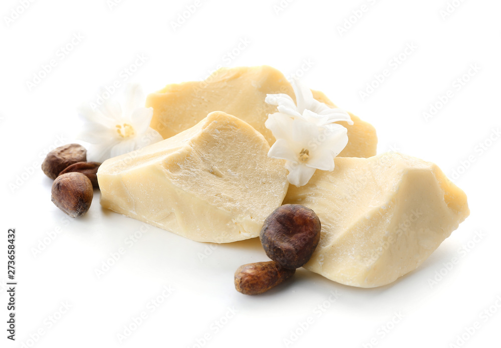 Pieces of cocoa butter on white background