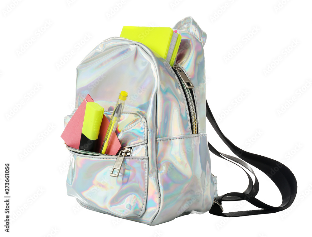 School backpack with stationery on white background