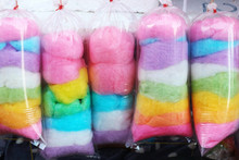 Multicoloured Cotton Candy In Plastic Bags At The City Festival