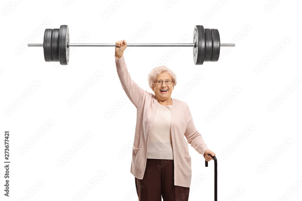 Senior woman with a cane liftiing a barbell - obrazy, fototapety, plakaty 