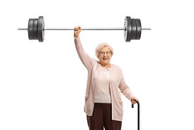 Senior Woman With A Cane Liftiing A Barbell
