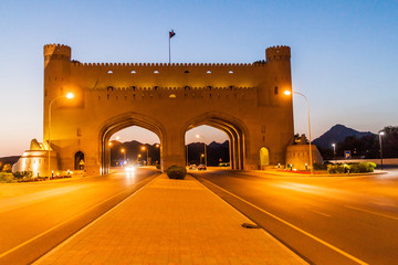 Wall Mural - Evening of the road passing through the Bahla Gate in Oman