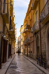 Sticker - Typical picturesque narrow street in the Old Town of Bari, Puglia region, Southern Italy.