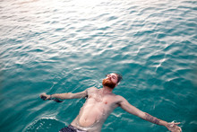 Man Floats In Ocean In Barbados