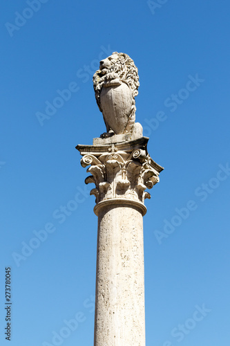 Sculpture Of A Lion On Top Of A Decorative Column In Siena
