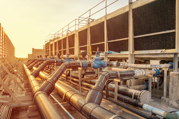 Cooling tower set in a large building Data center is installed on the roof - image