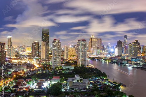 Fototapeta na szkło Bangkok City skyline aerial view at night time and skyscrapers of midtown, Bangkok, Thailand