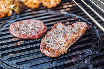 chef cooking grilled beef steak