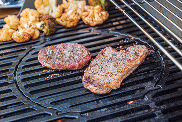 chef cooking grilled beef steak