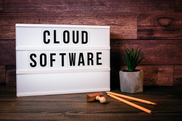 Wall Mural - cloud software. text in lightbox. wooden office table