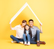 © Tom Wang - happy asian family  in new house with roof concept
