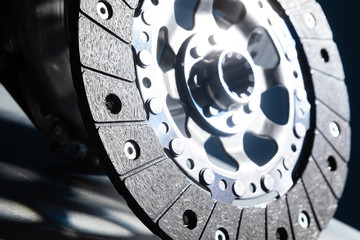 Wall Mural - Close-up shot of clutch disk and basket on dark background