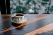 © weerawat - coffee cup on the table with sun light,vintage color tone.