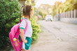 © nateejindakum - Happy student kids waiting for school bus with her bag on the side of the road. Concept for education open semester and back to school.