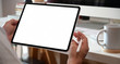 © bongkarn - Businessman using digital tablet mock up blank screen display