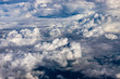 Clouds outside the airplane window. White clouds, View of the sky above the clouds.