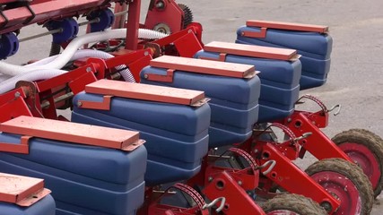 Wall Mural - Precision inline seeder. A row seeder. Seed drill. Agriculture machinery. Fragment of modern pneumatic precision seeder