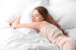 © Pixel-Shot - Beautiful young woman sleeping in bed