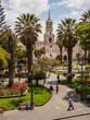 Plaza de armas of Arequipa in Peru. The cathedral and palm trees