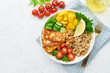 © Nata Bene - Buddha bowl with quinoa, halloumi, salad lettuce, vegeterian cuisine, white background, top view