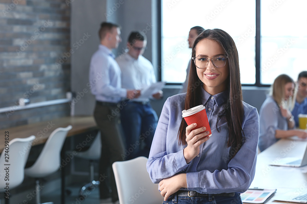 Young woman during business meeting in office