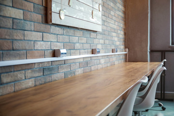 Wall Mural - Big wooden table in interior of modern office