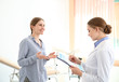 © Pixel-Shot - Young woman visiting her gynecologist in clinic