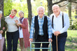 Group of senior people walking in park