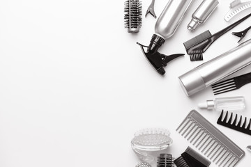 Set of hairdresser tools and accessories on white background