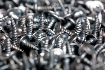 Sharp screws as abstract background