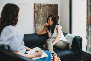 Wall Mural - Psychotherapy session, woman talking to his psychologist in the studio