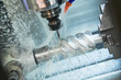 CNC milling machine work. Coolant and lubrication in metalwork industry
