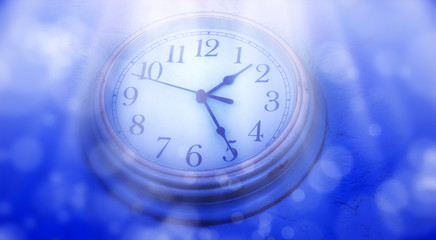 Wall Mural - abstract defocused lights and close up clock face over blue background