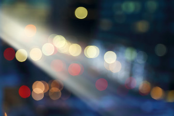 Wall Mural - Blurry background image of defocused colorful abstract city street lights at night