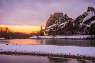 Wall Mural - Snow Covered Devin Castle Ruins above the Danube River in Bratislava, Slovakia at Sunrise