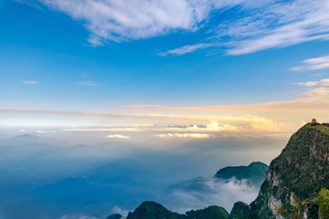 Wall Mural - Peaks and seas of clouds under blue sky and white clouds, Emei Mountain, Sichuan Province, China