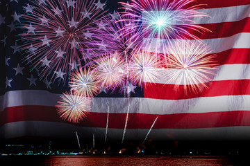 Canvas Print - Double exposure of Amazing beautiful colorful fireworks display on celebration night with USA flag, showing on the sea beach with multi color of reflection on water