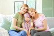 © Pixel-Shot - Little girl after chemotherapy with her family at home