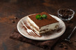 Tiramisu. Traditional italian dessert on white plate