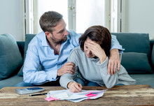 Young Couple Feeling Sad And Stressed Paying Bills Debts Mortgage Having Financial Problems