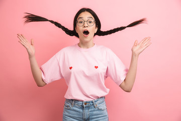 Sticker - Image closeup of optimistic happy girl with two pigtails wearing eyeglasses having fun and smiling at camera