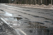broken road, potholes, puddles, bad russian highway