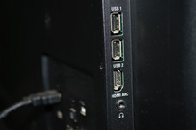 TV side details, with two usb inputs, one hdmi arc and headphone jack