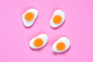 Wall Mural - group of egg fried on pink background